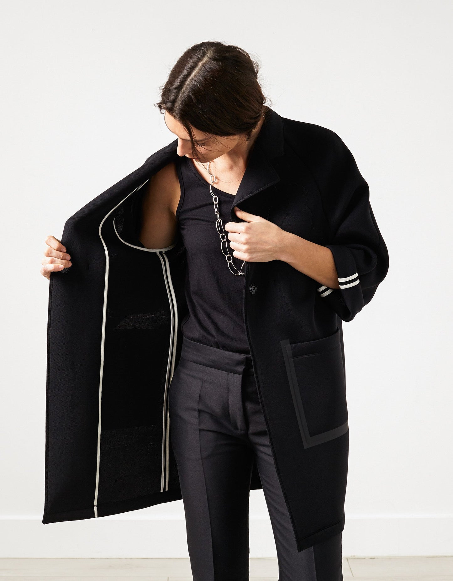 Manteau fleuri en néoprène noir